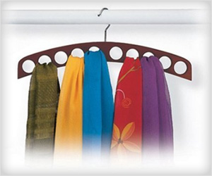 store scarves properly in dedicated scarf hanger in closet